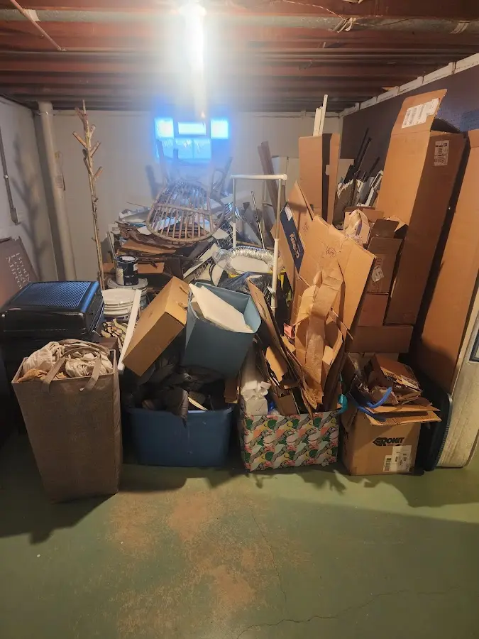 Roll-off dumpster container at job site for 4 Yard Dumpster Rental in Bella Vista